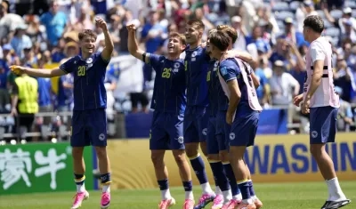 La celebración de los jugadores de Bosnia y Herzegovina tras su triunfo sobre Catar.