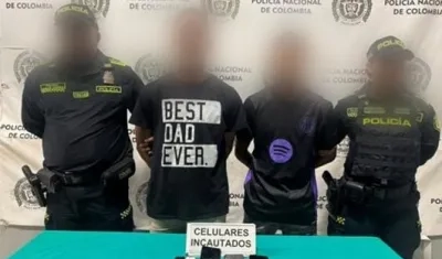 Dos de los capturados en el operativo. 