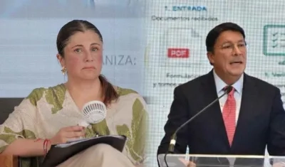 La defensora Iris Marín Ortiz y el registrador Hernán Penagos.
