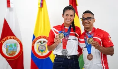 La tenista María Paulina Pérez y el pesista Duván Ferrer, medallistas de oro en los Juegos Centroamericanos y del Caribe.