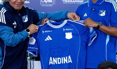 Juan Guillermo Cuadrado, nuevo jugador de Millonarios, con el técnico Alberto Gamero.