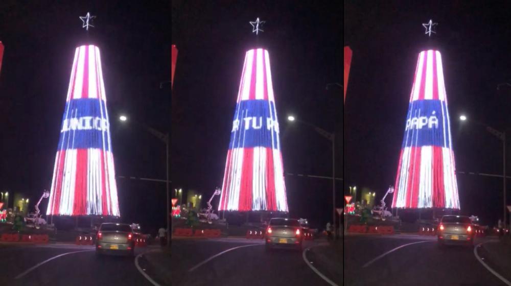El "Junior tu papá" del árbol de Navidad del monumento.