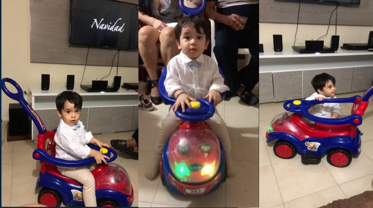 El pequeño Mateo Enrique disfrutando su regalo navideño.