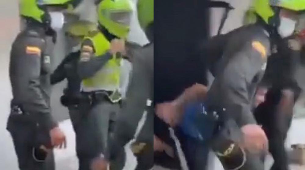 Momentos en que la Fuerza Pública evita el ataque de la comunidad.